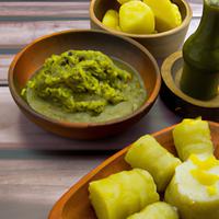 Boiled yuca with green sauce