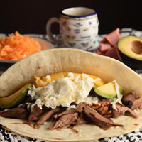 Brisket egg cheese avacado taco