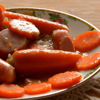Carrots and sausage in sauce