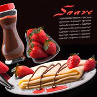 Crepe with chocolate spread and strawberries