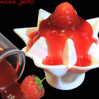 Frozen yogurt with strawberry sauce