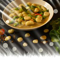 Gnocci and vegetables in herbsauce