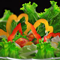 Green salad with tomatoes and bell peppers and salad leaves