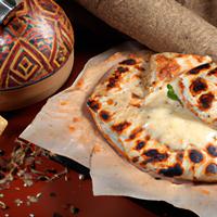 Grilled pita bread with cheese