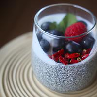 Half a cup chia milk puddibg with granola and berries