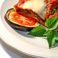 Half of an eggplant parmigiana