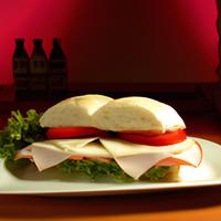 Ham and cheese sandwich with lettuce and tomato