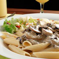 Olive gardens rigatoni creamy mushroom sauce with grilled chicken and a very small salad