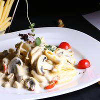 Pasta with cream sauce and vegetables