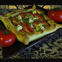 Pie with cheese and tomato