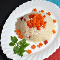 Rice with diced carrot and red pepper