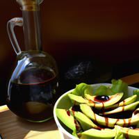 Salad with avocado and nextarines and olive oil and balsamic vinegar