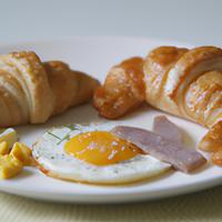 Sausage egg breakfast croissant