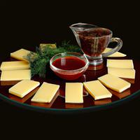 Sliced cheese with sauce