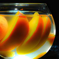 Sliced peaches in water