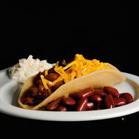 Taco with beans and triple cheese