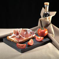 Toast with tomato and prosciutto