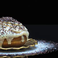 Yeast donut with vanilla frosting and chocolate sprinkles