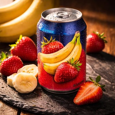 A can of jumex bannana and strawberry flavor