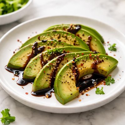 Avocado slices with balsamic glaze
