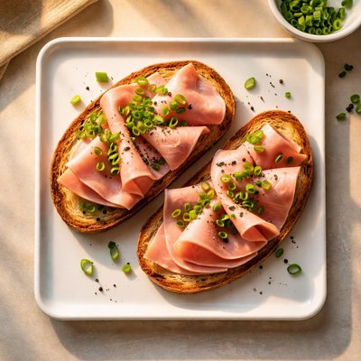 Bread with ham and green onions