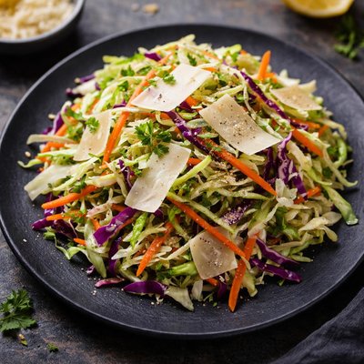 Cabbage salad with carrot and parmigian cheese