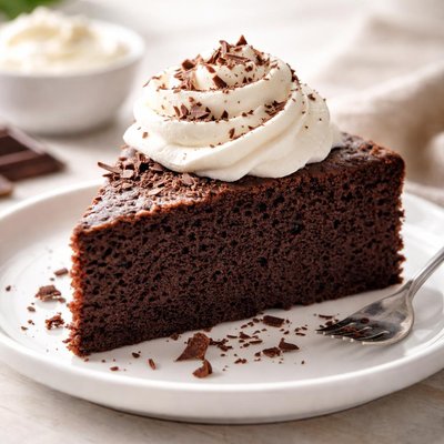 Chocolate cake with whipped cream