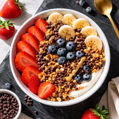 Fruit bowl with strawberries and chocolate chips