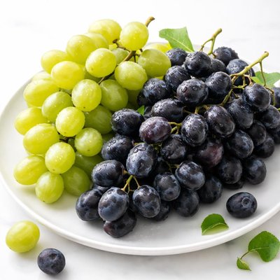 Green and black grapes