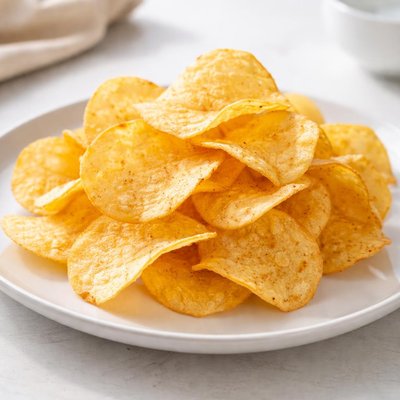Handful of potatoes chips