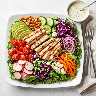 Large salad bowl with dressing