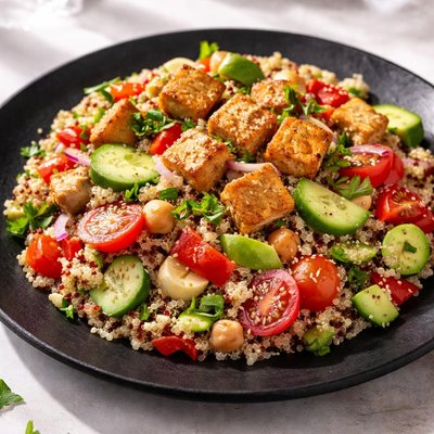 Quinoa salad with vegetables and tofu