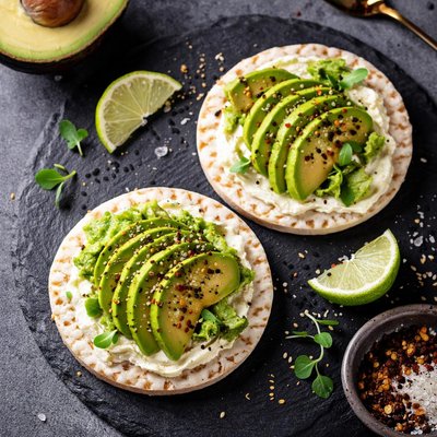 Rice cake with cheese and avocado