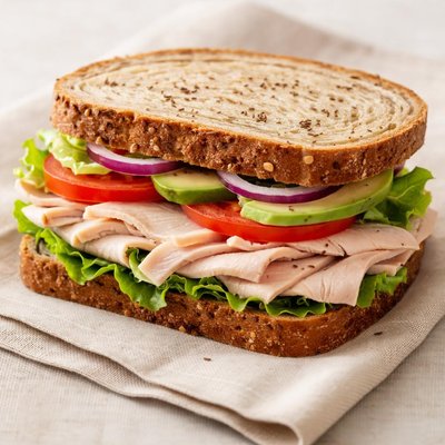 Roast turkey sandwich on rye bread