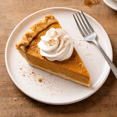 Slice of pie with whipped cream