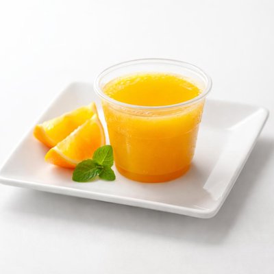 Small solo cup of orange juice