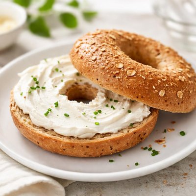 Whole wheat bagel with cream cheese
