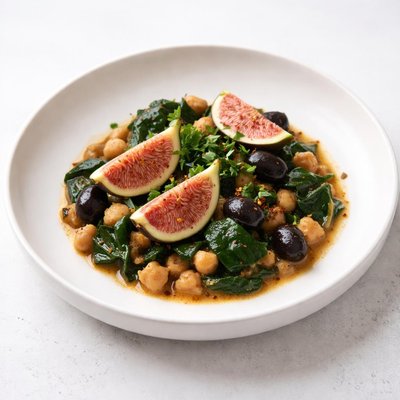 Image of Chickpea and Spinach with Fresh Figs and Black Olives Tajine