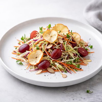 Image of Coleslaw with Grapes Crunchy Apple Chips and Almonds