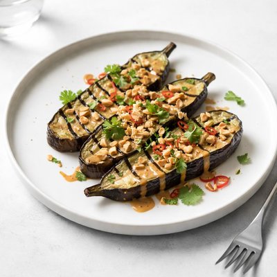 Image of Grilled Eggplant with Spicy Peanut Sauce
