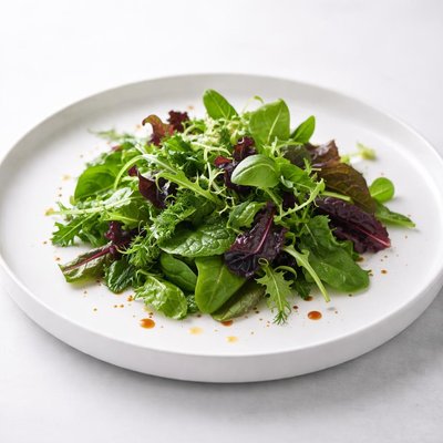 Image of Mesclun with Fresh Herbs and Earl Grey Balsamic Vinaigrette