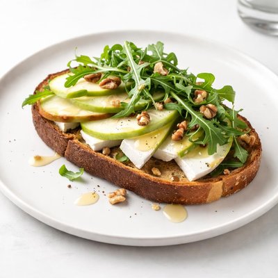 Image of Open Face Brie Apple and Arugula Sandwich
