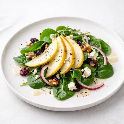 Image of Pear and Spinach Salad with Goat Cheese Vinaigrette