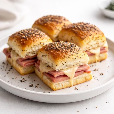 Image of Poppy Seed Glazed Hot Ham and Cheese Sandwiches