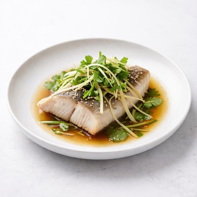 Image of Sake Steamed Sea Bass W Ginger Green Onions