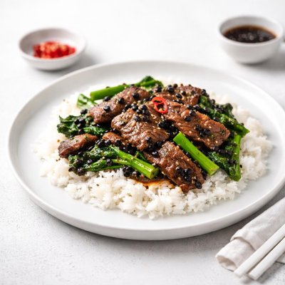 Image of Sliced Beef with Black Beans Chinese Broccoli on Rice