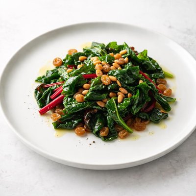 Image of Swiss Chard or Spinach with Pine Nuts and Raisins Ww