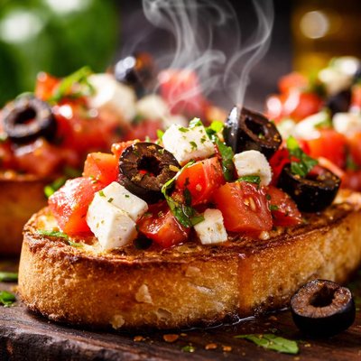 Image of Tomatoes Feta and Black Olives Bruschetta