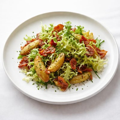 Image of Warm Frisee Salad with Fingerlings and Bacon