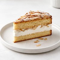 Almond Cake with Meringue and Whipped Cream Filling
